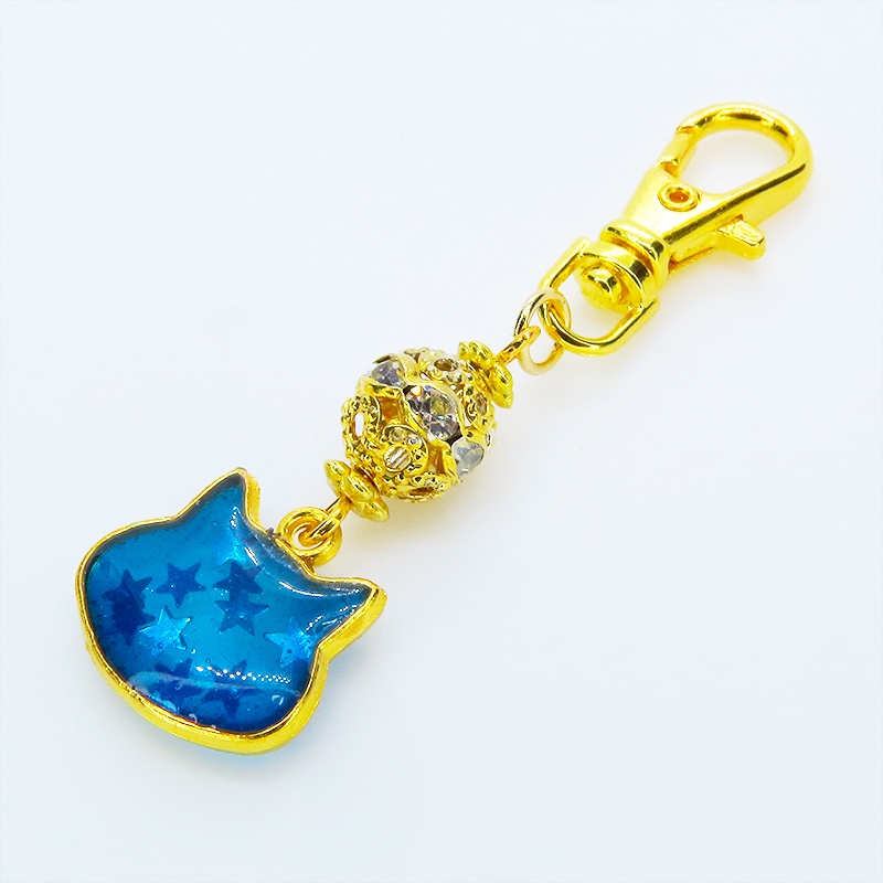 ブルーキャットスターキーホルダー ゴールドカラー 青い猫フェイスに星を散りばめたキーホルダー メタルビーズ