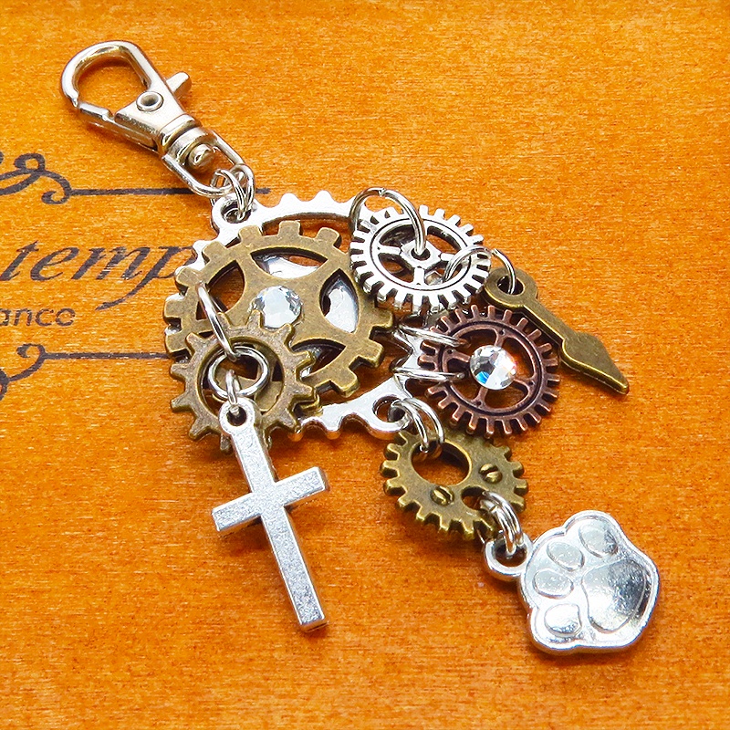 アンティークシルバー 歯車と肉球を組合せたスチームパンク風キーホルダー バッグチャーム ラインストーン