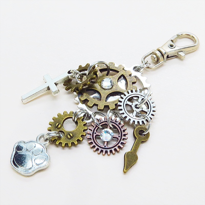 アンティークシルバー 歯車と肉球を組合せたスチームパンク風キーホルダー バッグチャーム ラインストーン