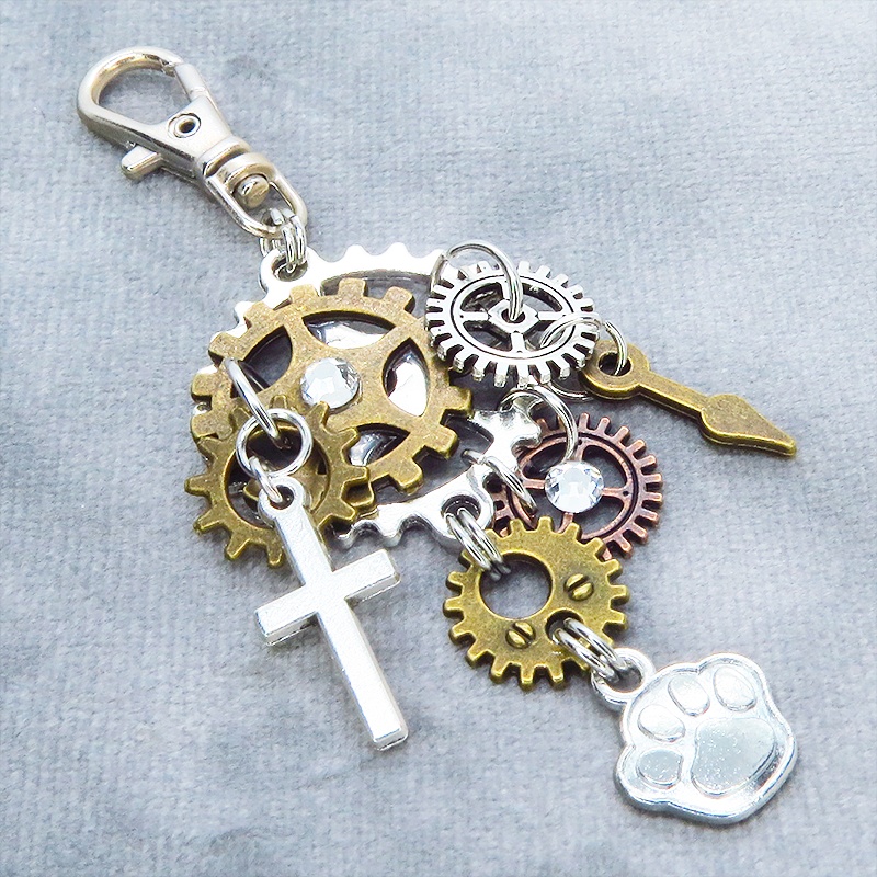 アンティークシルバー 歯車と肉球を組合せたスチームパンク風キーホルダー バッグチャーム ラインストーン