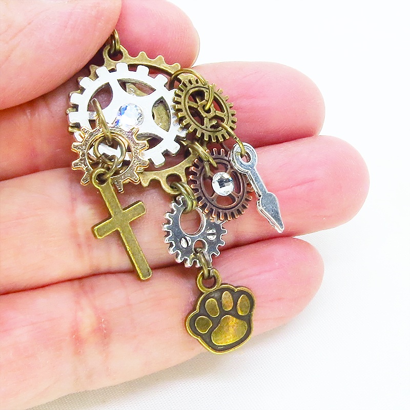 アンティークゴールド 歯車と肉球を組合せたスチームパンク風キーホルダー バッグチャーム ラインストーン 犬 猫
