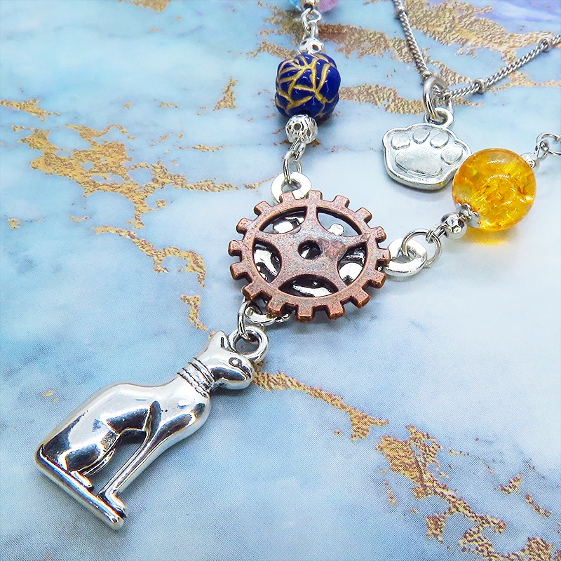 シルバーカラー バステト 猫の神様 オリエンタル風 ダブルチェーン ビーズを組合わせたアシンメトリーネックレス アジャスター可