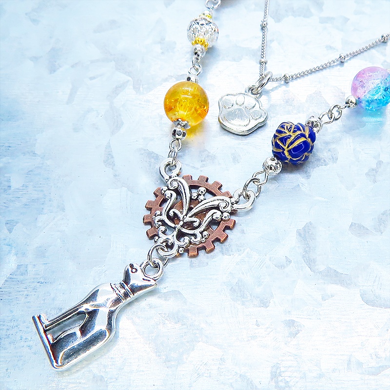 シルバーカラー バステト 猫の神様 オリエンタル風 ダブルチェーン ビーズを組合わせたアシンメトリーネックレス アジャスター可