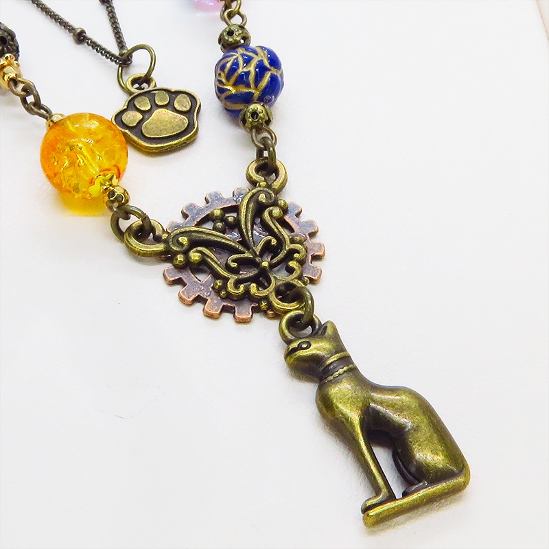 アンティークゴールド バステト 猫の神様 オリエンタル風 ダブルチェーン ビーズを組合わせたアシンメトリーネックレス アジャスター可