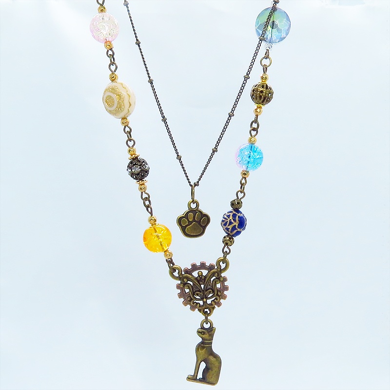 アンティークゴールド バステト 猫の神様 オリエンタル風 ダブルチェーン ビーズを組合わせたアシンメトリーネックレス アジャスター可