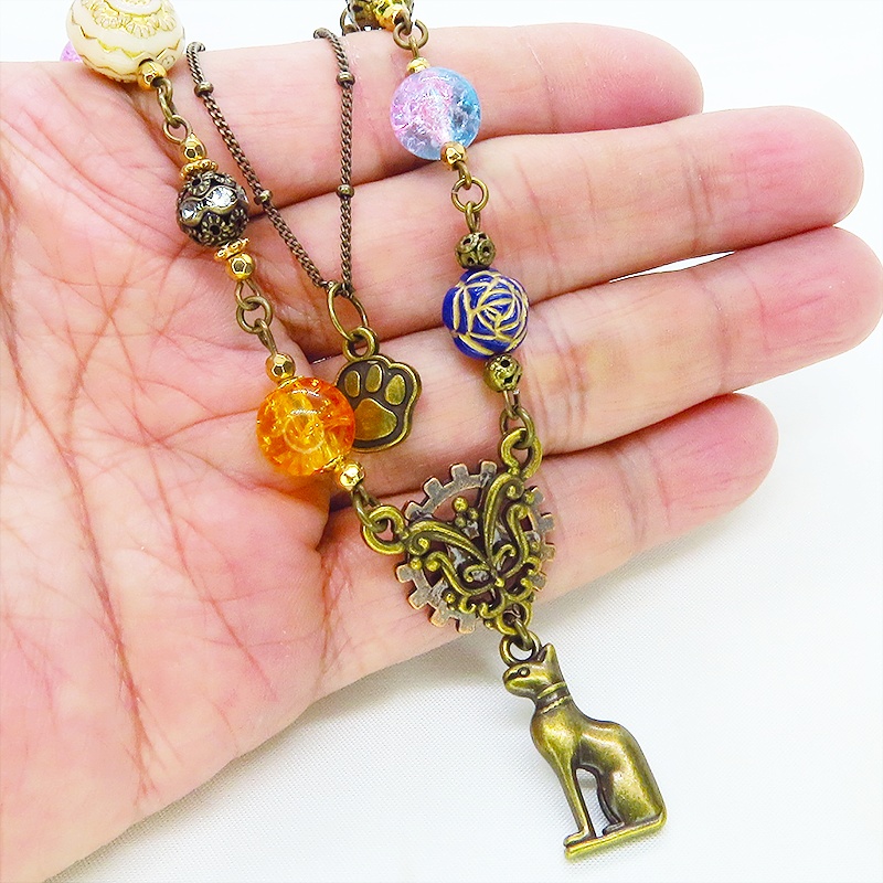 アンティークゴールド バステト 猫の神様 オリエンタル風 ダブルチェーン ビーズを組合わせたアシンメトリーネックレス アジャスター可