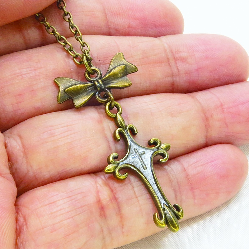 アンティークゴールド ゴシック調ロザリオとリボンチャームを組合せたネックレス 長さ調整可 アジャスター可