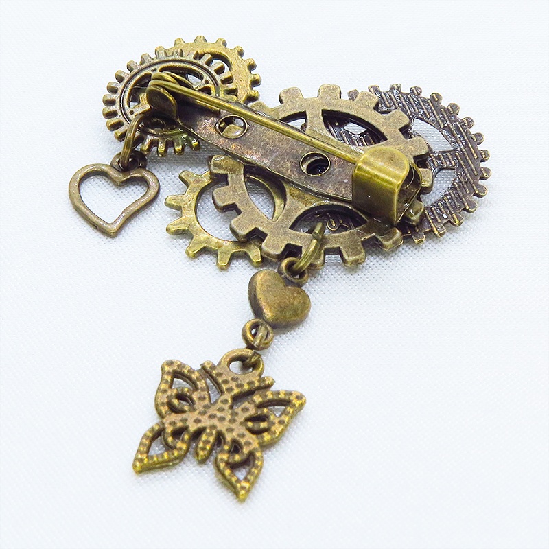 アンティークゴールド 蝶々と歯車を組合せたスチームパンク風ブローチ ハート ラインストーン