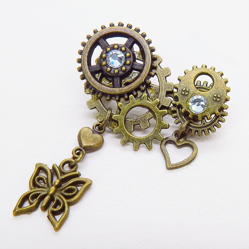 アンティークゴールド 蝶々と歯車を組合せたスチームパンク風ブローチ ハート ラインストーン