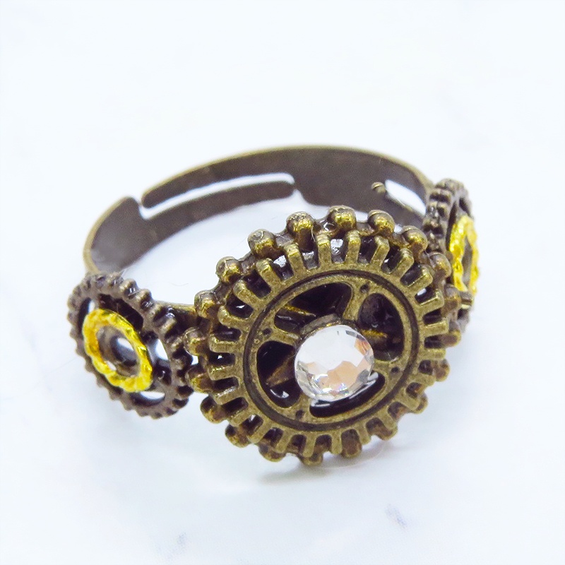 アンティクゴールドリング ラインストーンに歯車を組合せたスチームパンク風リング 指輪 フリーサイズ