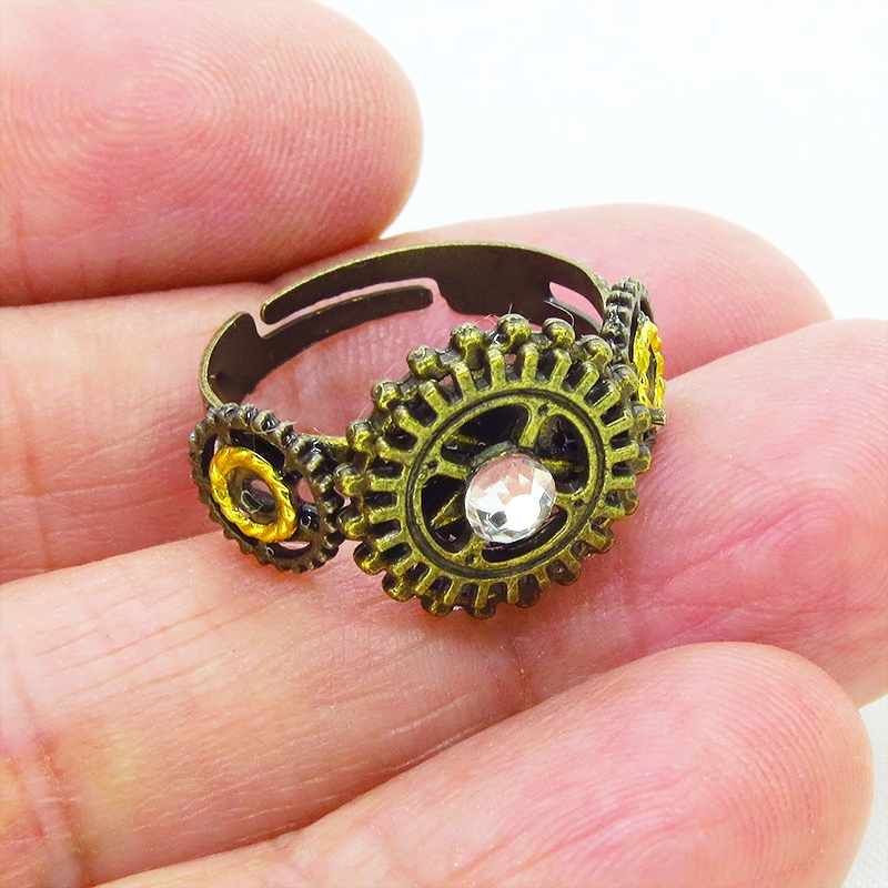 アンティクゴールドリング ラインストーンに歯車を組合せたスチームパンク風リング 指輪 フリーサイズ