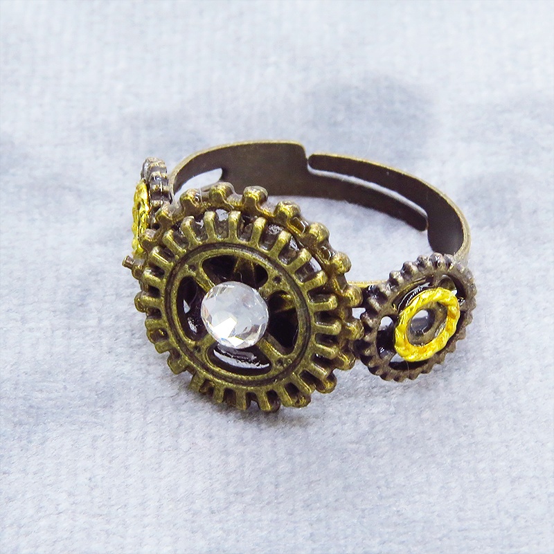 アンティクゴールドリング ラインストーンに歯車を組合せたスチームパンク風リング 指輪 フリーサイズ