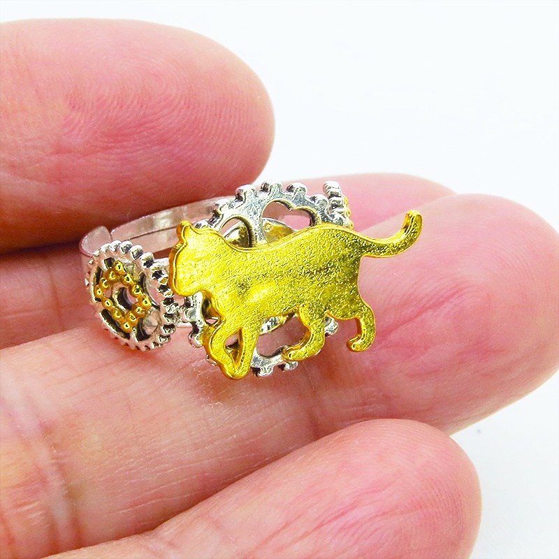 シルバーカラーリング 歩く猫シルエットモチーフに歯車を組合せたスチームパンク風リング 指輪 フリーサイズ