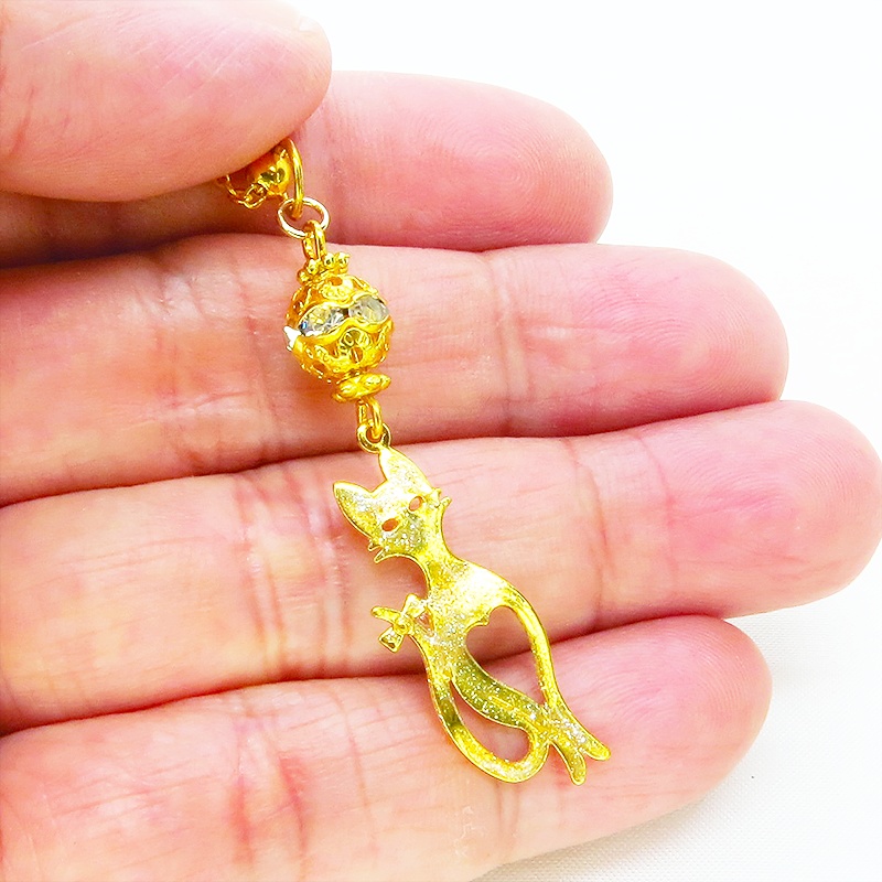 ラメ入りゴールドカラーのスマートな猫シルエットモチーフとメタルビーズのペンダントネックレス 長さ調整可