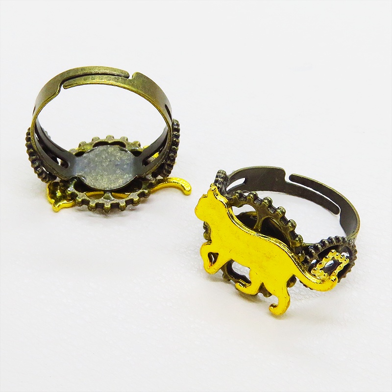 アンティークゴールドリング 歩く猫シルエットモチーフに歯車を組合せたスチームパンク風リング 指輪 フリーサイズ