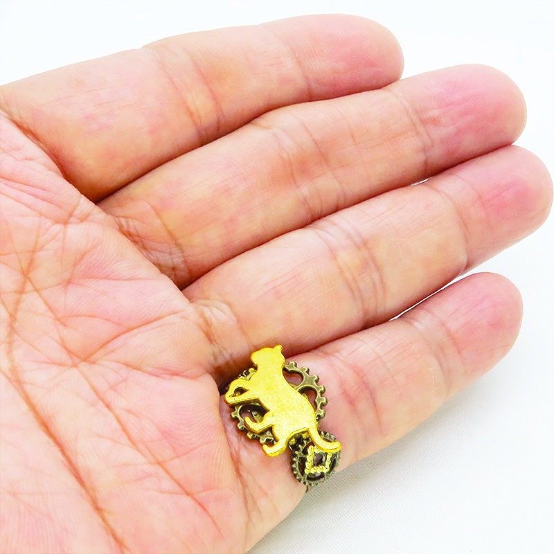 アンティークゴールドリング 歩く猫シルエットモチーフに歯車を組合せたスチームパンク風リング 指輪 フリーサイズ