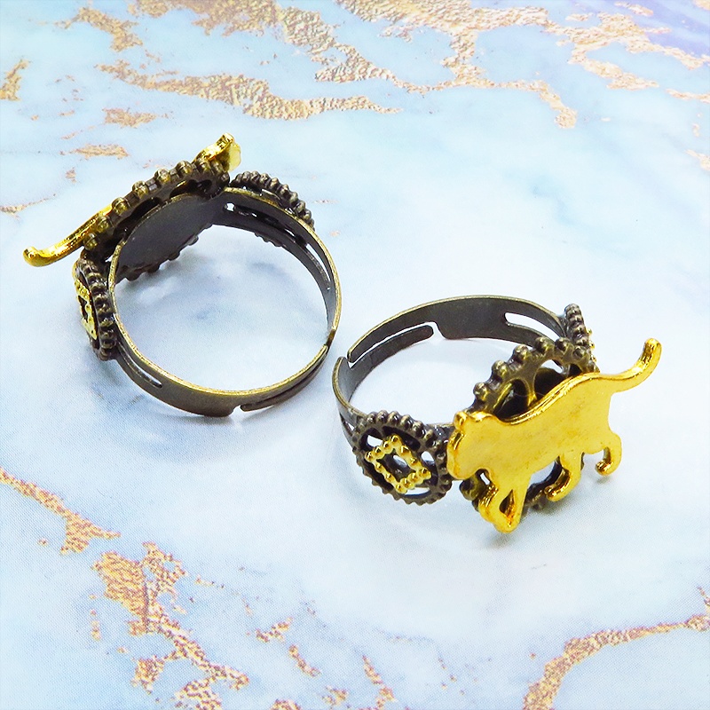 アンティークゴールドリング 歩く猫シルエットモチーフに歯車を組合せたスチームパンク風リング 指輪 フリーサイズ