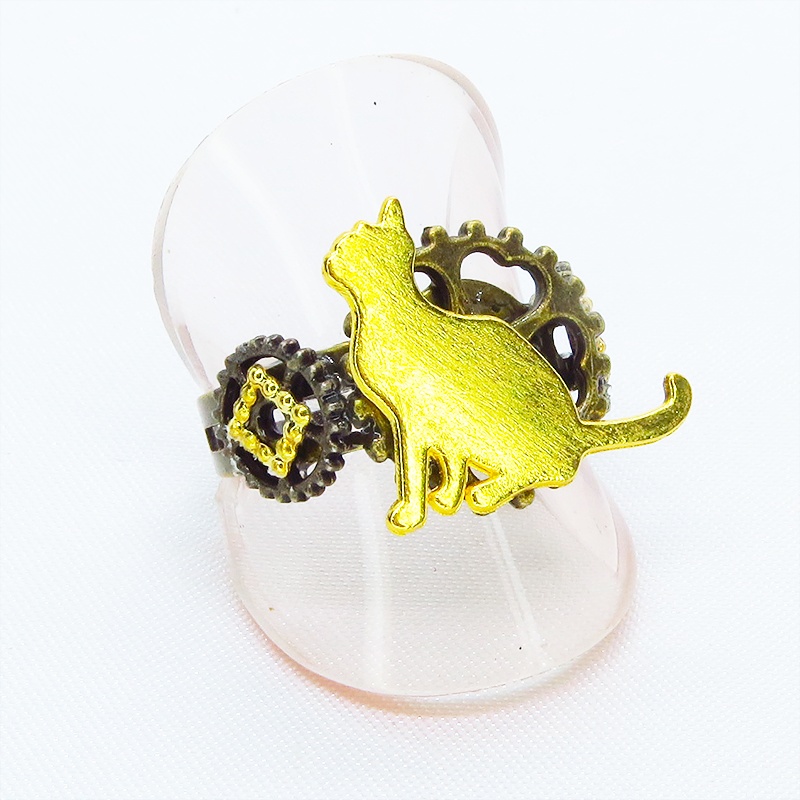 アンティークゴールドリング 見上げる猫シルエットモチーフに歯車を組合せたスチームパンク風リング 指輪 フリーサイズ