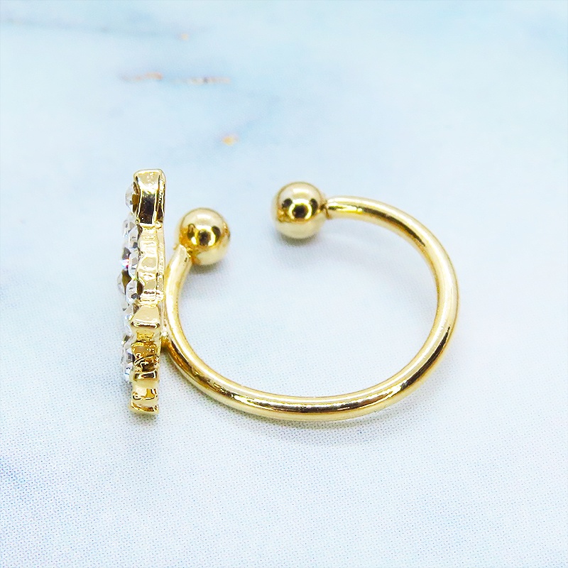 ゴールドカラー 猫フェイスモチーフのかわいいイヤーカフ(左耳用) ラインストーン(クリアカラー)