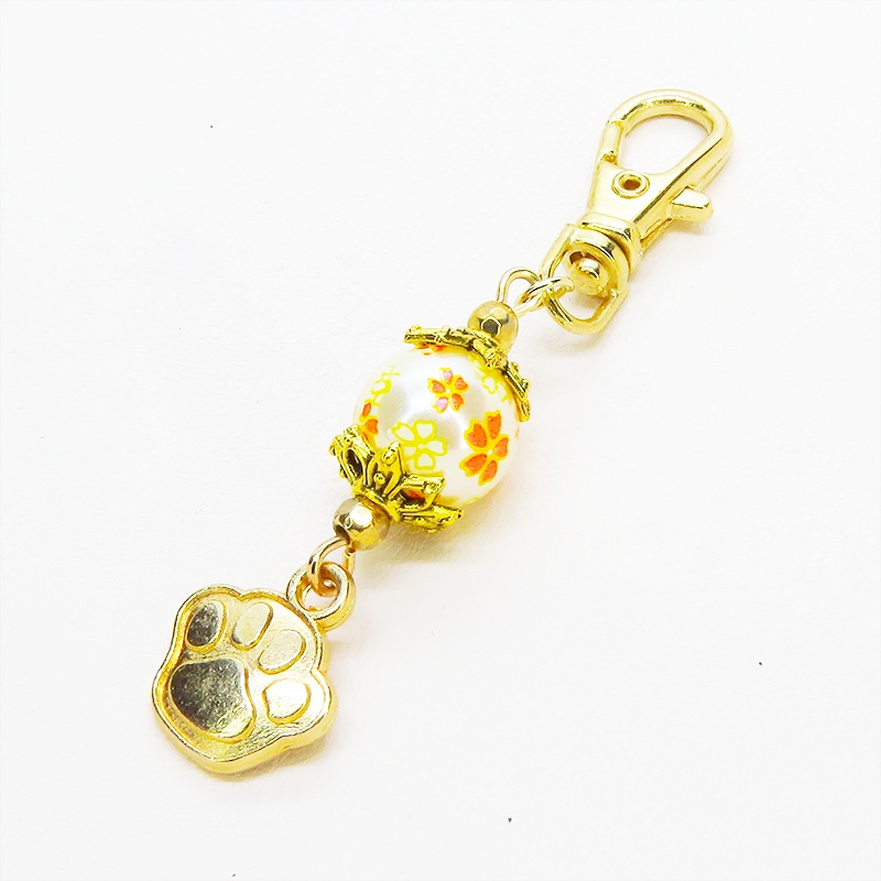 マットゴールド 肉球チャームと花模様のビーズを組合せた大人可愛いキーホルダー 金具変更可