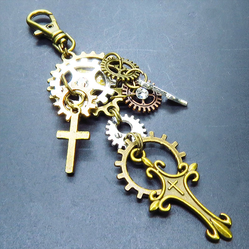 アンティークゴールド 歯車とロザリオを組合せたスチームパンク風キーホルダー バッグチャーム ラインストーン 金具変更可