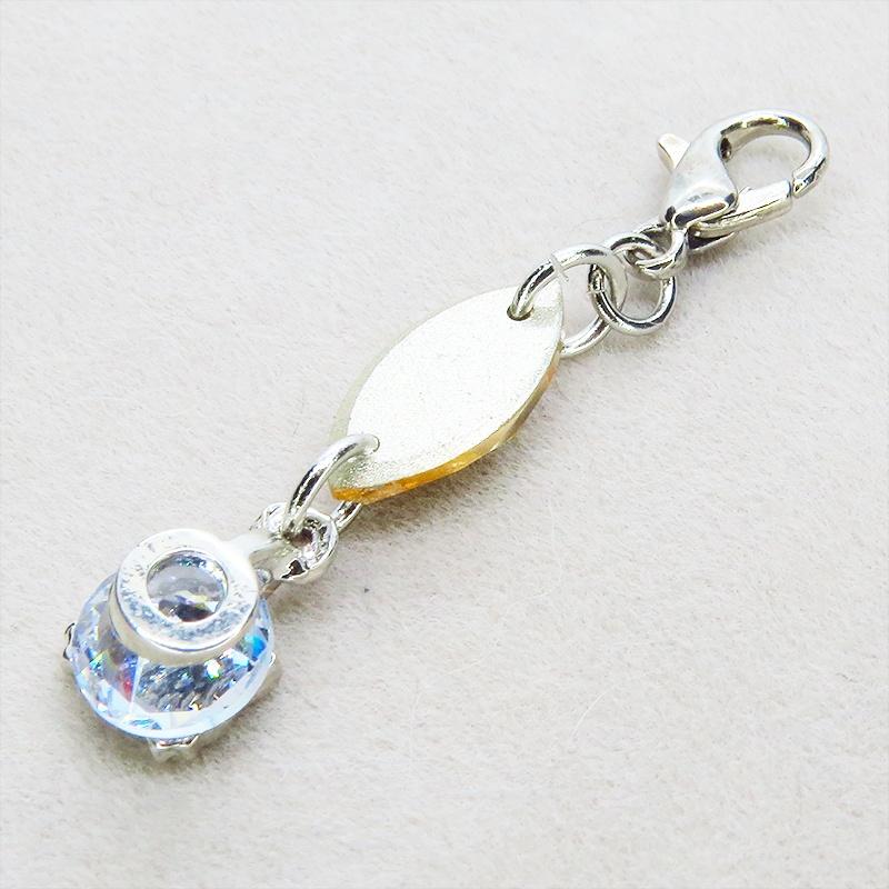 マスク・スマホチャーム シルバーカラー 猫フェイスクリスタルにスワロフスキー(ゴールドシャドー)をプラスしたチャーム 金具変更可