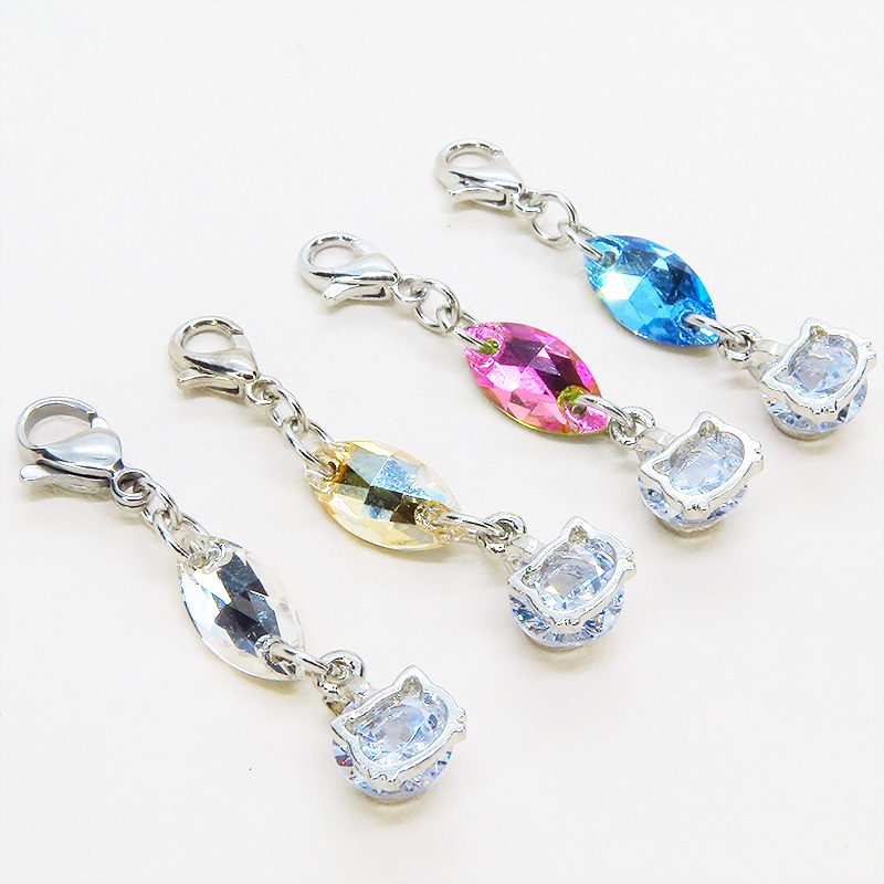 マスク・スマホチャーム シルバーカラー 猫フェイスクリスタルにスワロフスキー(ゴールドシャドー)をプラスしたチャーム 金具変更可