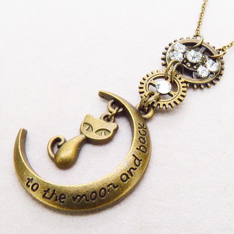 アンティークゴールド スチームパンク風の猫と三日月と歯車のペンダントネックレス ラインストーン 長さ調整可