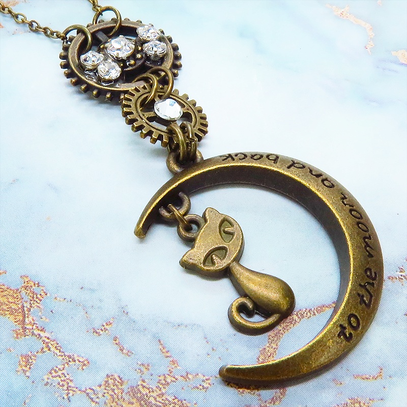 アンティークゴールド スチームパンク風の猫と三日月と歯車のペンダントネックレス ラインストーン 長さ調整可