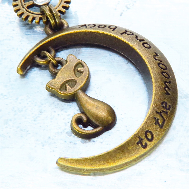 アンティークゴールド スチームパンク風の猫と三日月と歯車のペンダントネックレス ラインストーン 長さ調整可