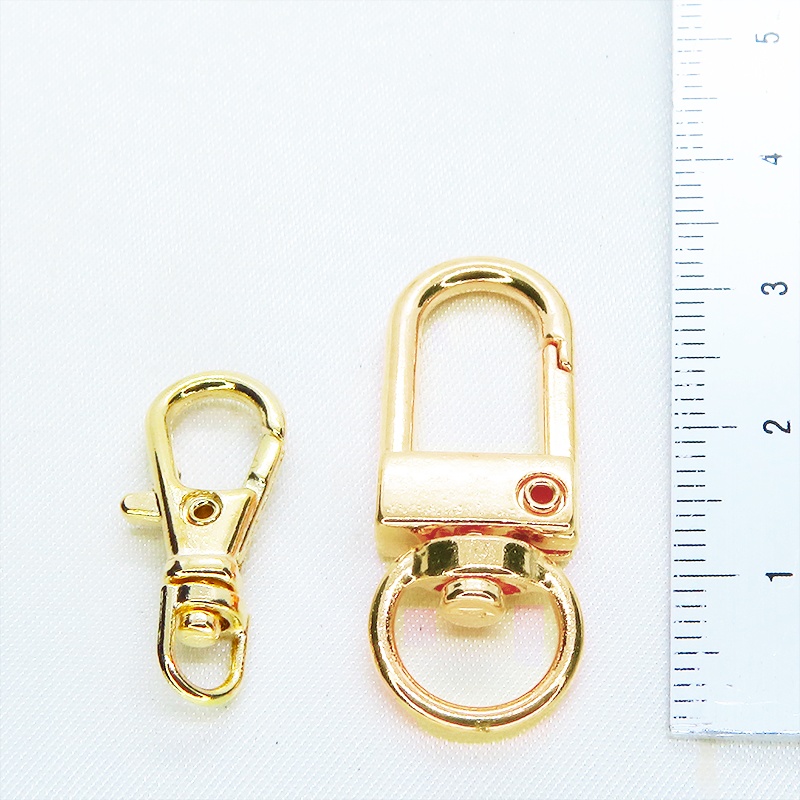 マットゴールド 白猫黒猫丸まってお休みチャームのキーホルダー メタルビーズ 金具変更可