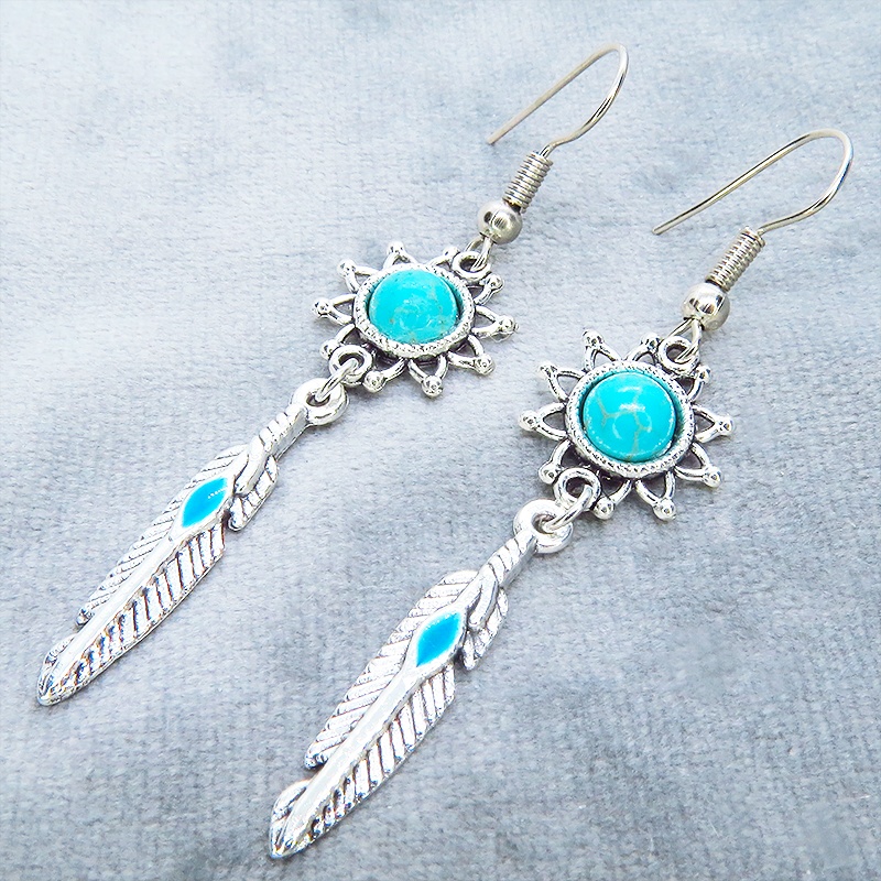 シルバーカラー フェザーとターコイズのひまわりを組合せたスリムなピアス サージカル可