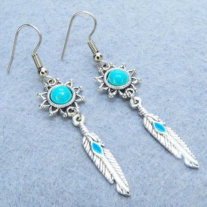 シルバーカラー フェザーとターコイズのひまわりを組合せたスリムなピアス サージカル可