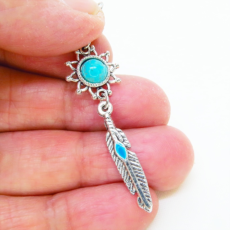シルバーカラー フェザーとターコイズのひまわりを組合せたスリムなピアス サージカル可