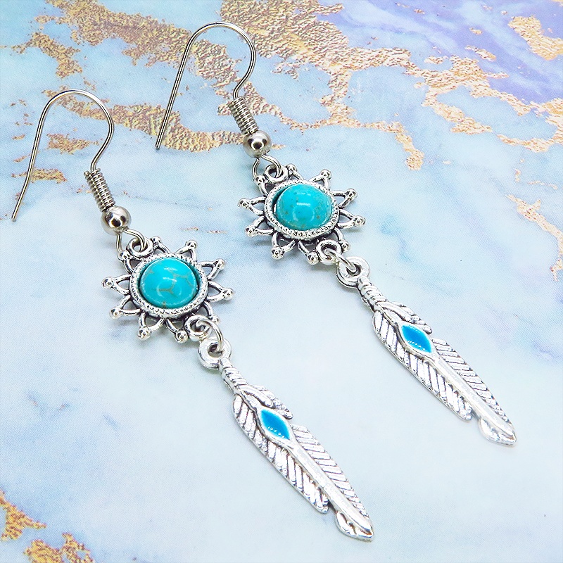 シルバーカラー フェザーとターコイズのひまわりを組合せたスリムなピアス サージカル可