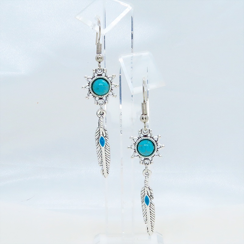 シルバーカラー フェザーとターコイズのひまわりを組合せたスリムなピアス サージカル可