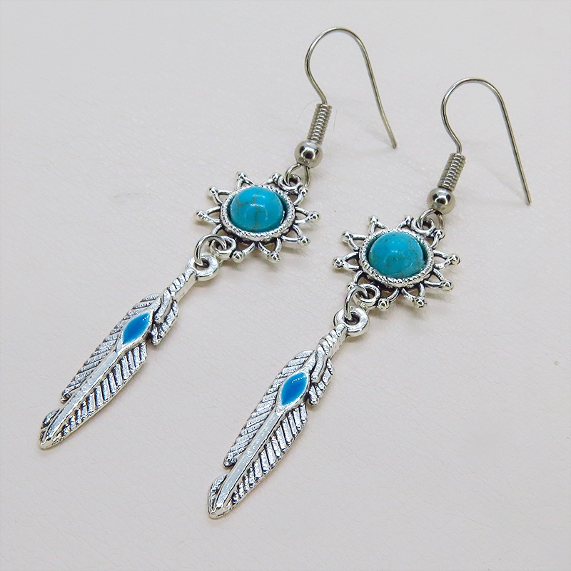 シルバーカラー フェザーとターコイズのひまわりを組合せたスリムなピアス サージカル可