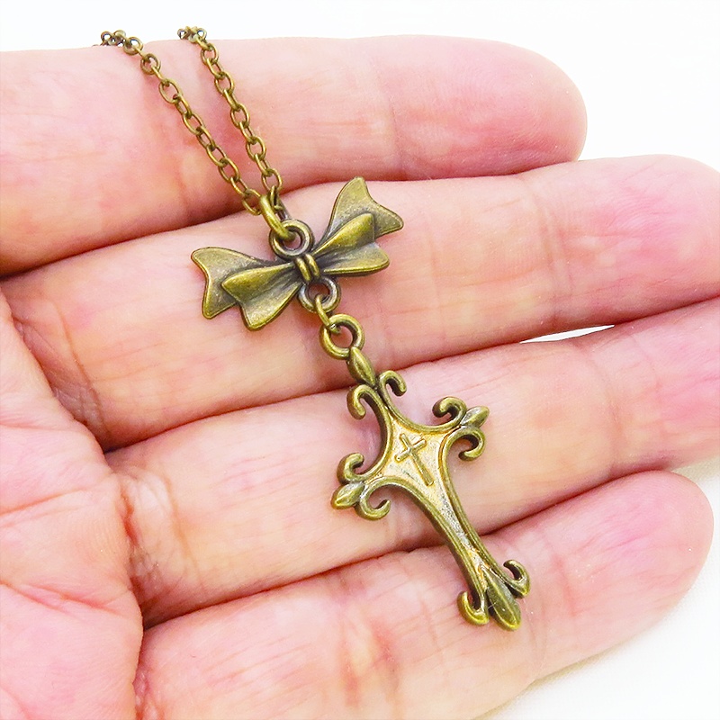 アンティークゴールド ゴシック調ロザリオとリボンのスリムなネックレス 長さ調整可