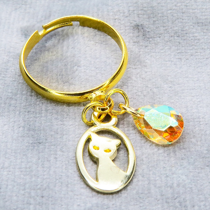 ゴールドカラー 猫とスワロフスキーの大人可愛いリング クリスタルサン フリーサイズ