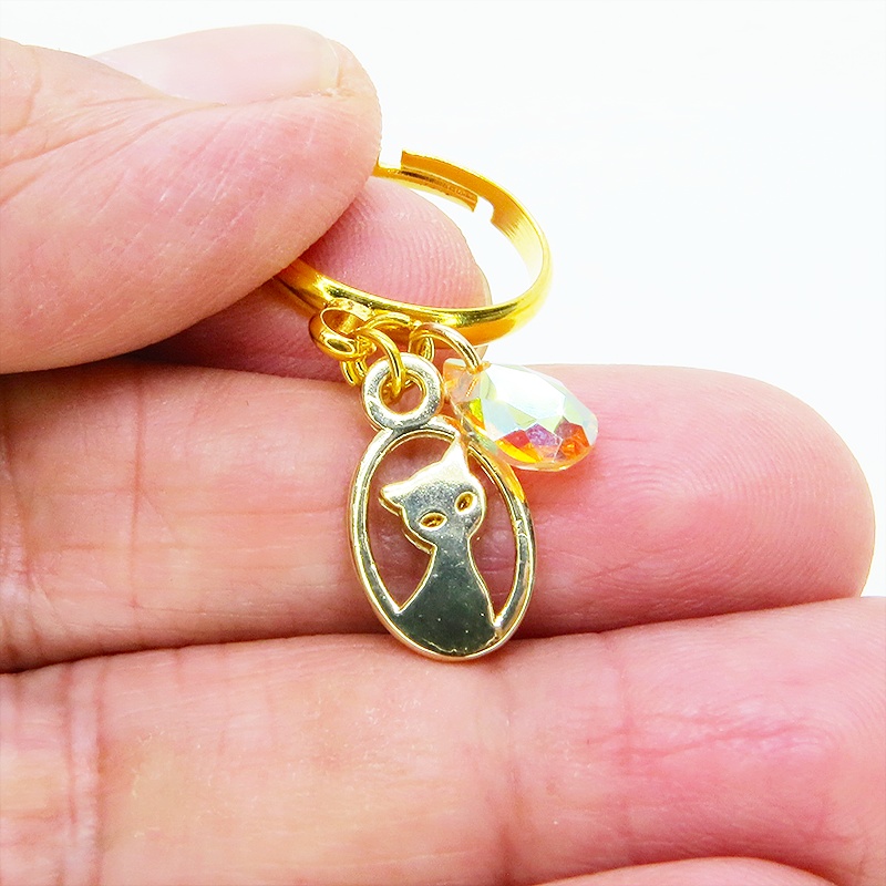 ゴールドカラー 猫とスワロフスキーの大人可愛いリング クリスタルサン フリーサイズ