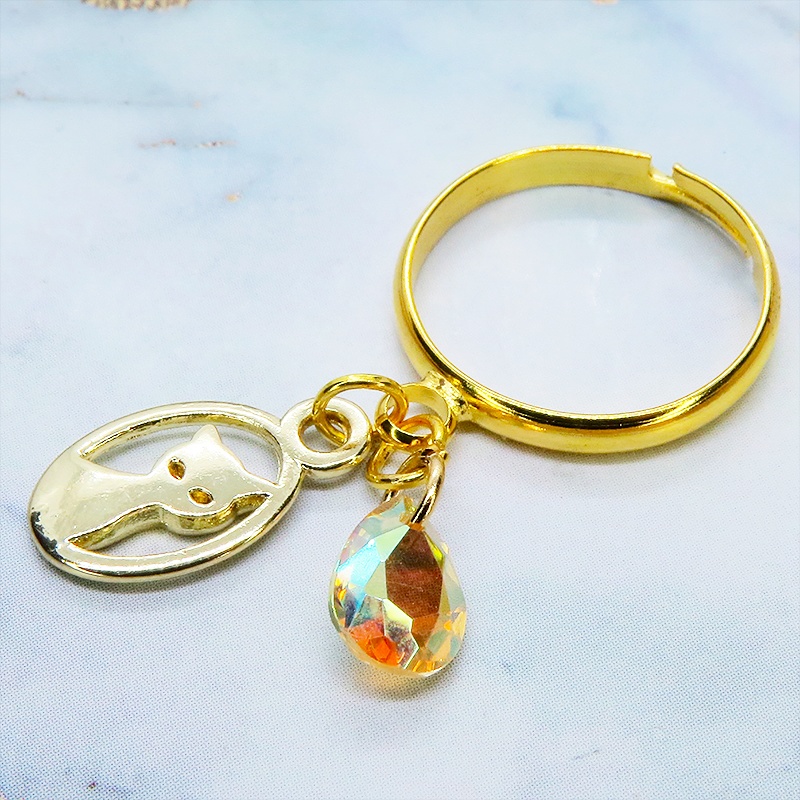 ゴールドカラー 猫とスワロフスキーの大人可愛いリング クリスタルサン フリーサイズ