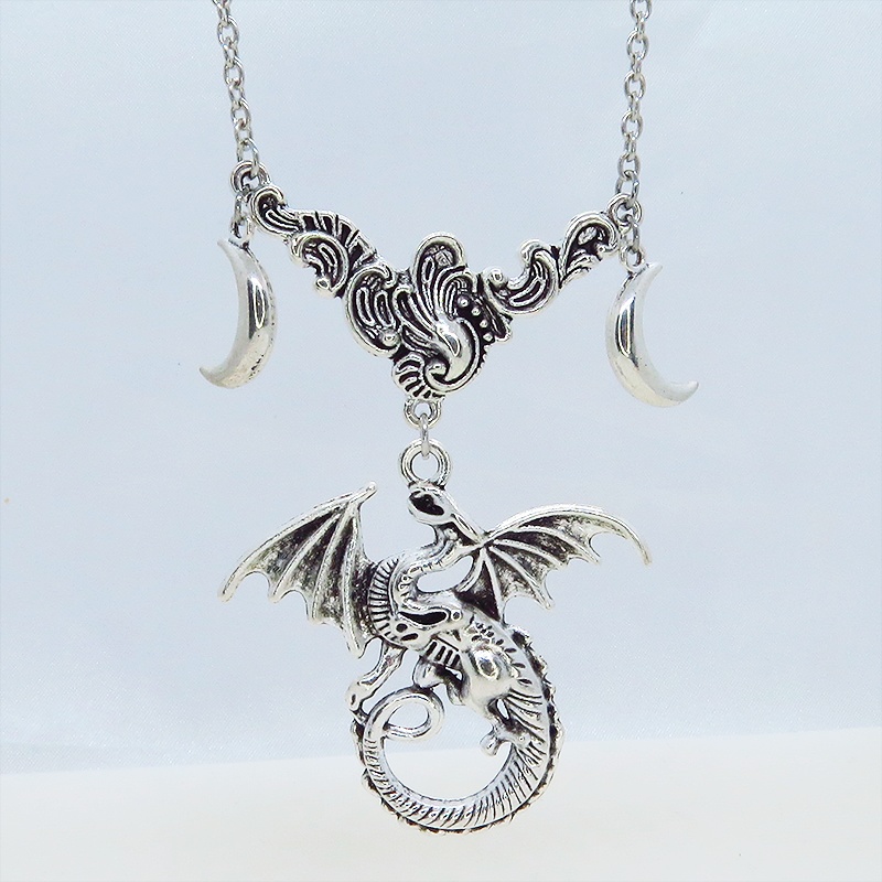 アンティークシルバー ドラゴンと三日月モチーフのペンダントネックレス ロングネックレス