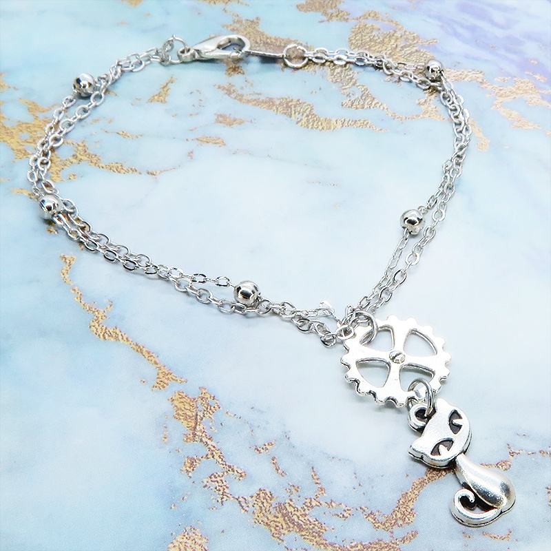 シルバーカラー 猫と歯車モチーフのダブルチェーンブレスレット ビーズ付チェーン アジャスター可