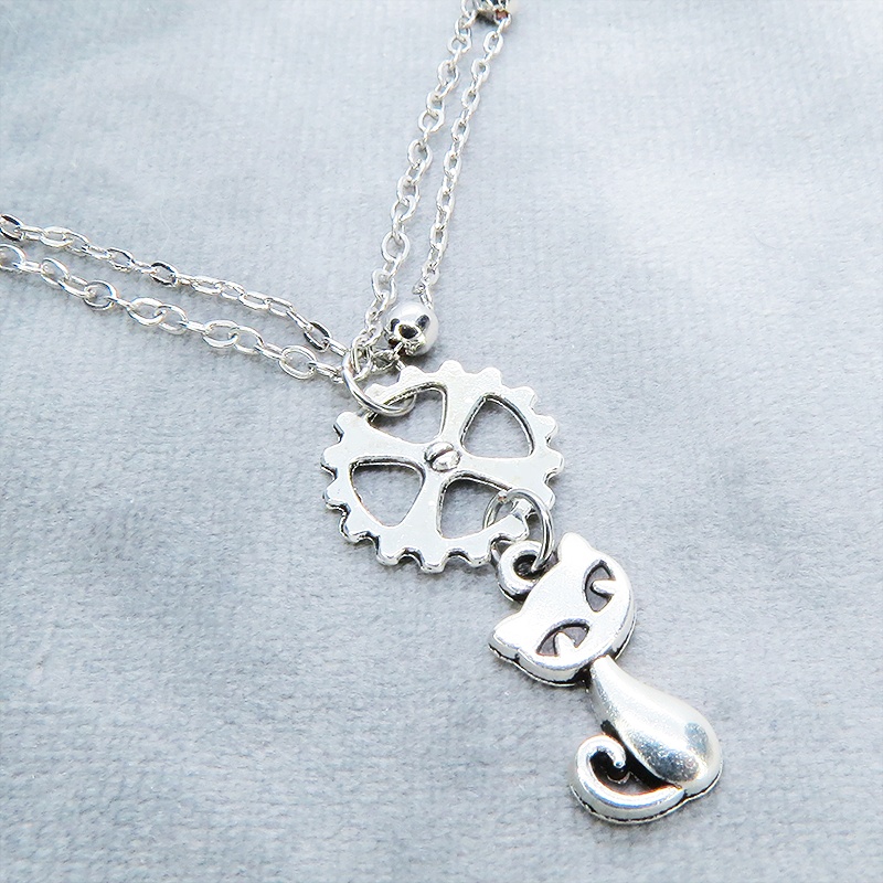 シルバーカラー 猫と歯車モチーフのダブルチェーンブレスレット ビーズ付チェーン アジャスター可