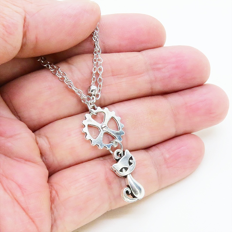 シルバーカラー 猫と歯車モチーフのダブルチェーンブレスレット ビーズ付チェーン アジャスター可