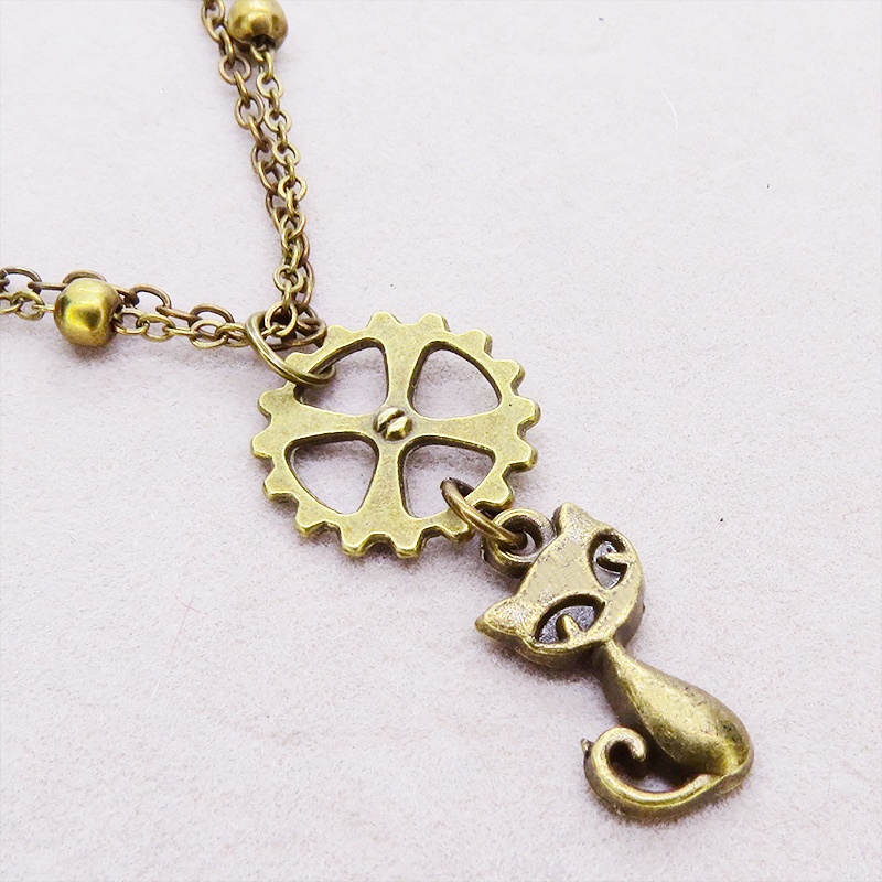 アンティークゴールド 猫と歯車モチーフのダブルチェーンブレスレット ビーズ付チェーン アジャスター可