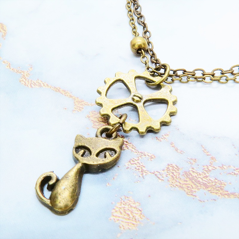 アンティークゴールド 猫と歯車モチーフのダブルチェーンブレスレット ビーズ付チェーン アジャスター可