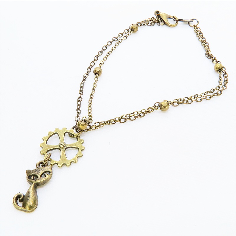 アンティークゴールド 猫と歯車モチーフのダブルチェーンブレスレット ビーズ付チェーン アジャスター可