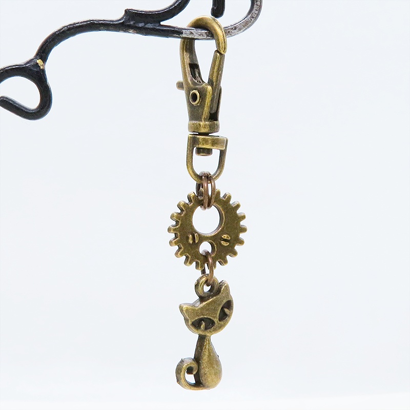 アンティークゴールド 猫と歯車・ギアを組合せたコンパクトなキーホルダー 金具交換可