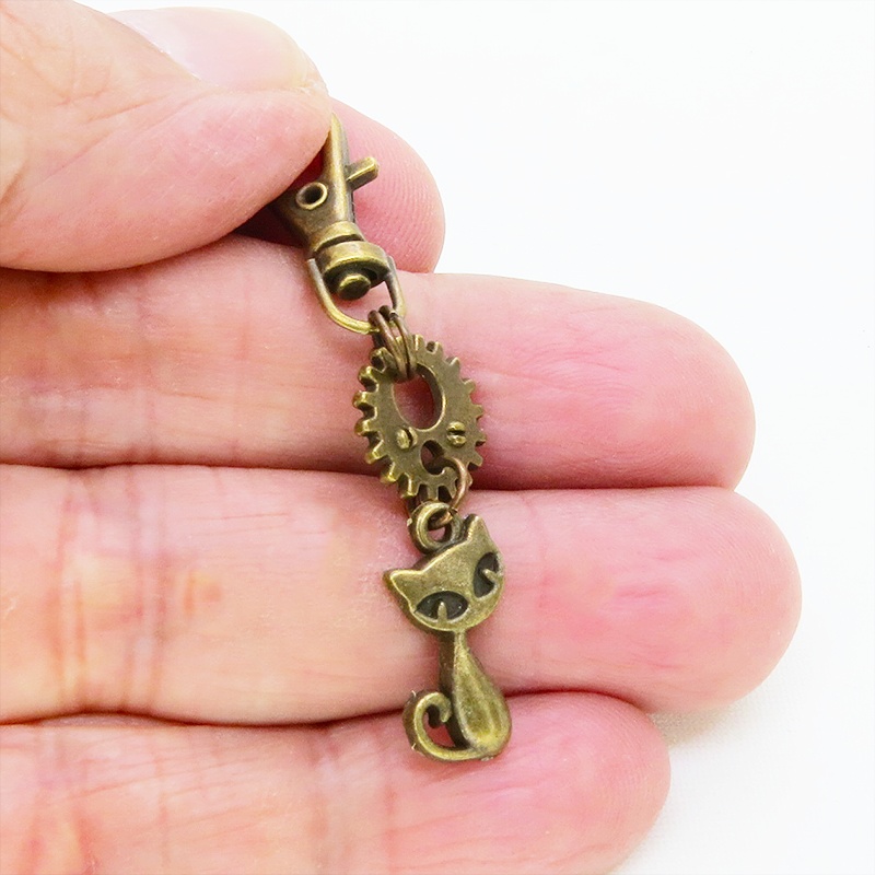 アンティークゴールド 猫と歯車・ギアを組合せたコンパクトなキーホルダー 金具交換可